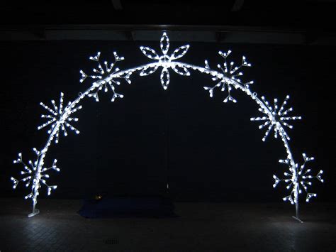 SNOWFLAKE ARCH | Christmas centerpieces, Outdoor christmas lights, Christmas light show