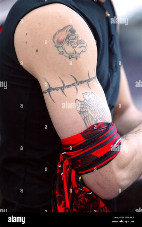 An ac milan fan shows off his tattoos hi-res stock photography and ...