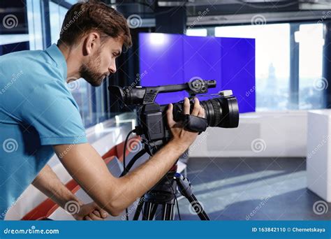 Professional Video Camera Operator Working Stock Photo - Image of music ...