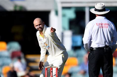 Nathan Lyon reacts after completing 400 wickets in Test cricket