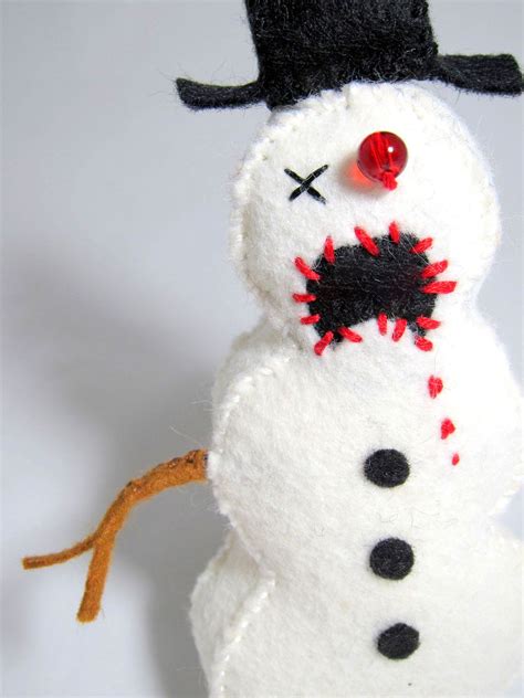 Ways to scare my children off of loving Christmas: #1) Zombie Snowman Ornament | Zombie ...