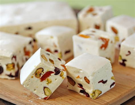 White Chocolate Nougat is a soft, fluffy homemade nougat with a sweet vanilla-white chocolate ...