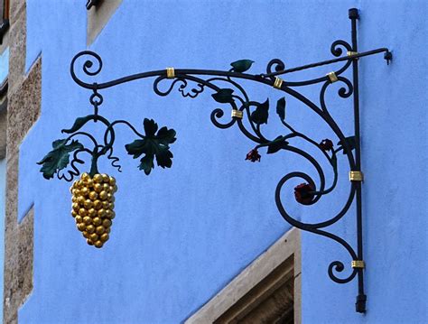 Wrought iron sign in Rothenburg | Wrought iron sign, Wrought, Home ...