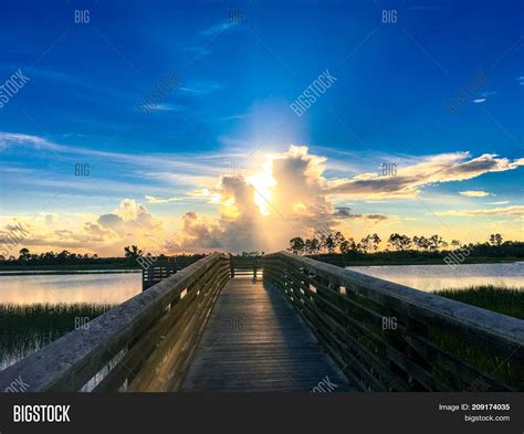 Reflection Sunset Over Image & Photo (Free Trial) | Bigstock