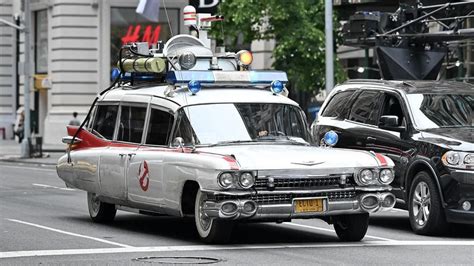 Ghostbusters sequel filming seemingly arrives in New York as Ecto-1 is seen racing through city ...