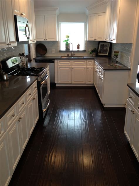 White Kitchen With Dark Wood Floors - ZTech