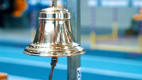 Bell Ringing At Finish Line Of Athletes Stock Footage SBV-336313081 - Storyblocks