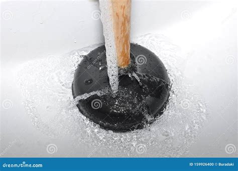 Plunger and clogged sink stock photo. Image of household - 159926400