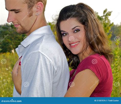 Young Couple in Warm Embrace Stock Photo - Image of loving, embrace: 21307076