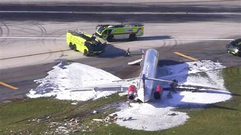 Video captures moment plane bursts into flames after crash landing at Miami airport | The Australian