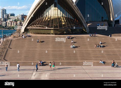 Sydney, Australia - November 13, 2016: Tourists and locals relaxing on stairs of iconic Sydney ...