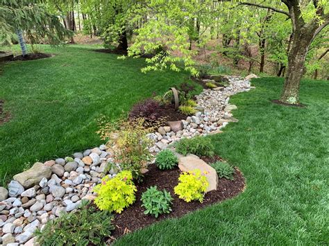 Custom Dry Creek Beds for Effective Drainage | Independence Landscape