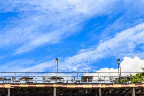 Many Table and Chairs on the Restaurant Deck Against the Sky. Stock Photo - Image of empty ...