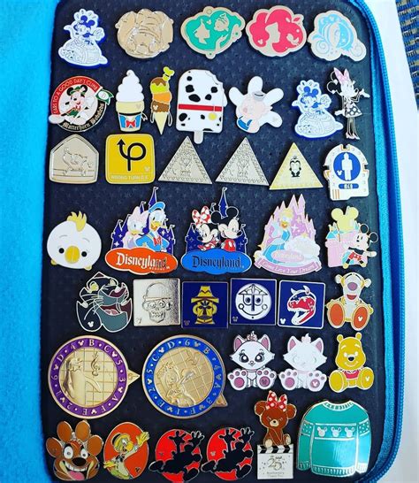 Pin trading haul from pin boards and cast lanyards at Disneyland resort ...