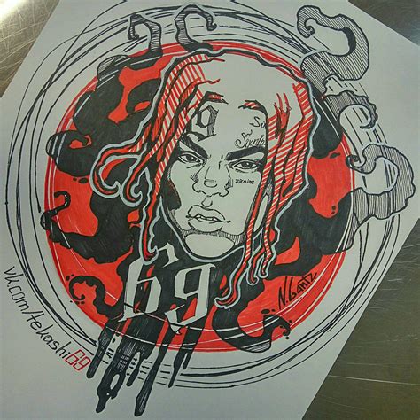 a drawing of a woman's face in red and black ink on white paper