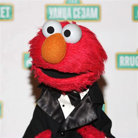 Download Elmo laughing and spreading joy | Wallpapers.com