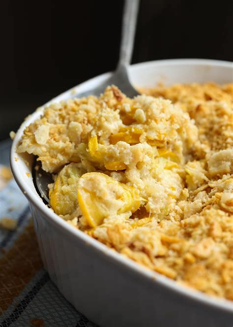 Squash Casserole is an easy side dish recipe! Creamy, cheesy, and loaded with yellow squash, pe ...