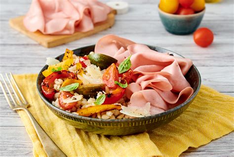 Barley salad with mortadella, peppers, cherry tomatoes and Parmigiano ...