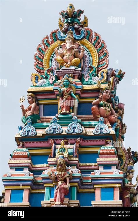 Hindu deities, painted statues, on a temple gopuram in Bangalore Stock ...