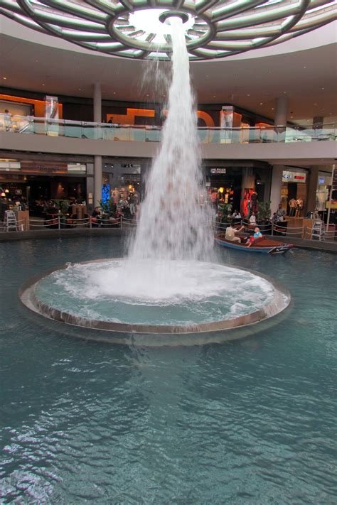 The fountain in the mall at the Marina Bay Sands in Singapore. A few times a day, the water ...