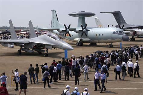 Tensions flare as Chinese flights near Taiwan intensify | AP News