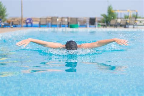 Young Girl Swimming Butterfly Stroke Style Stock Image - Image of ...