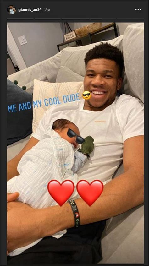 Giannis and Liam Charles: Antetokounmpo poses with son on his lap