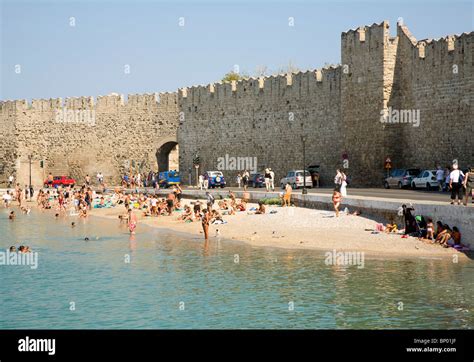 Beach and old town walls, Rhodes town, Greece Stock Photo - Alamy