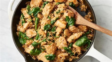 One-Pot Creamy Garlic Chicken and Rice Recipe - Tablespoon.com