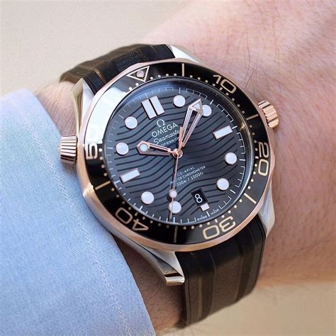 he Omega Seamaster Diver 300M in steel and rose gold with black ceramic ...