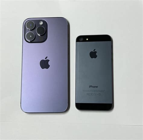 14 pro max deep purple vs iPhone 5 black. Found my old iPhone 5 that ...