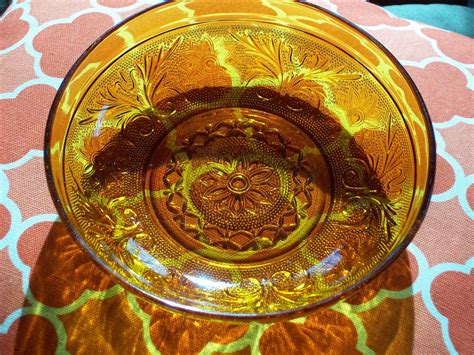 Vintage amber Indiana Depression glass. Floral pattern.