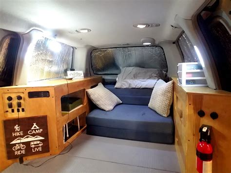 I bought a minivan and converted it into a camper! | Mini van, Minivan camper conversion, Camper ...