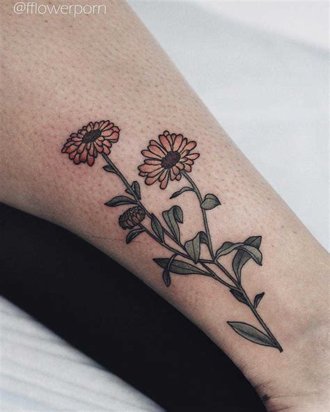 Calendula tattoo by Olga Nekrasova - Tattoogrid.net