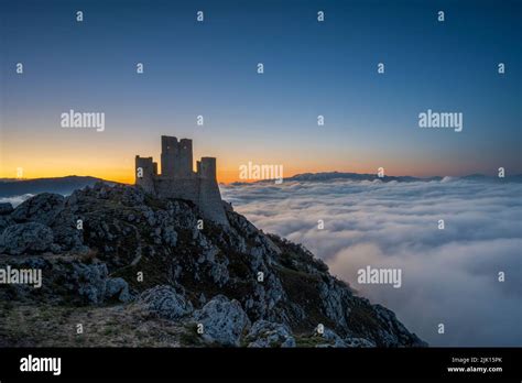 Rocca Calascio at sunrise with cloud inversion, Calascio, L'Aquila ...