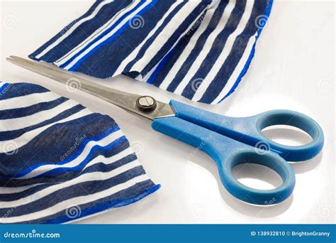 Striped Fabric Cut with Scissors Stock Photo - Image of colored ...