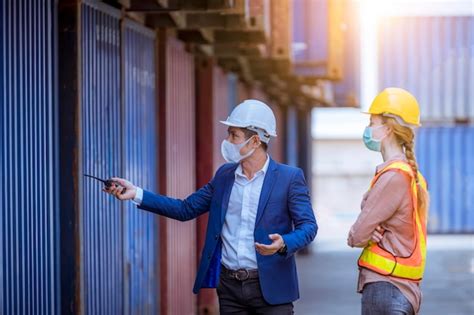 Premium Photo | Portrait team dock workers posing under working and ...