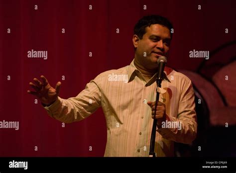 The stand-up comedian Paul Sinha performs at a comedy night in south London Stock Photo - Alamy