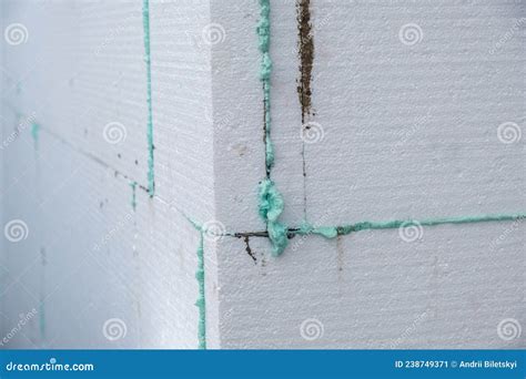 Installation of Styrofoam Insulation Sheets on House Facade Wall for ...