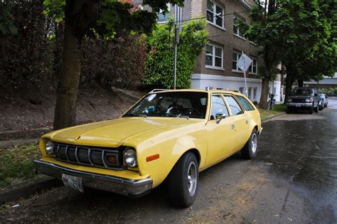 OLD PARKED CARS.: 1977 AMC Hornet Wagon.