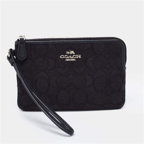 Coach Black Signature Canvas and Leather Wallet Coach | The Luxury Closet