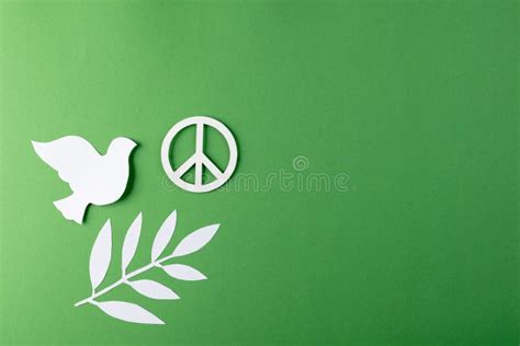 Close Up of White Dove and Peace Sign with Leaves and Copy Space on Green Background Stock Image ...