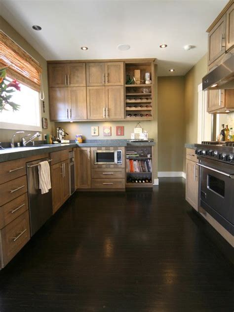 dark wood cabinets with light wood floors - Aaron Hollis