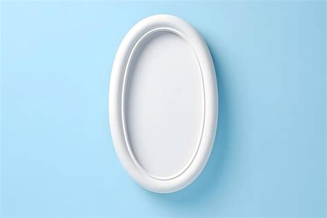 Premium Photo | A white oval frame on a blue background