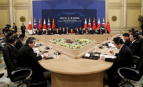 China, Japan, South Korea Pledge Economic Cooperation at First Summit ...