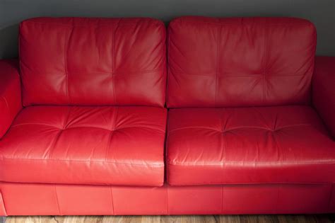 Elegant Red Leather Sofa in a Living Room 12144630 Stock Photo at Vecteezy