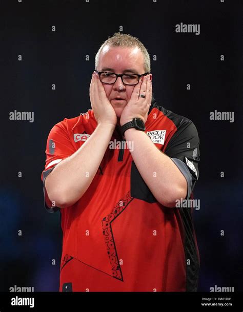 Stephen Bunting in action against Michael Smith during day fourteen of ...