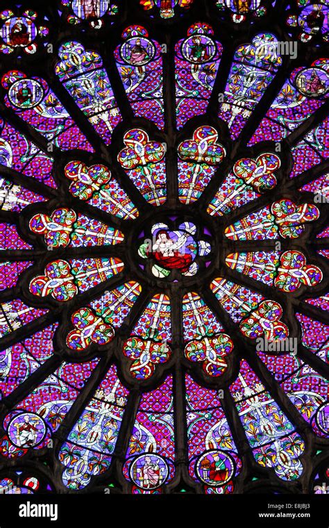 Basilica of St. Denis. North transept. Stained glass Window (a detail). Rose window above the ...