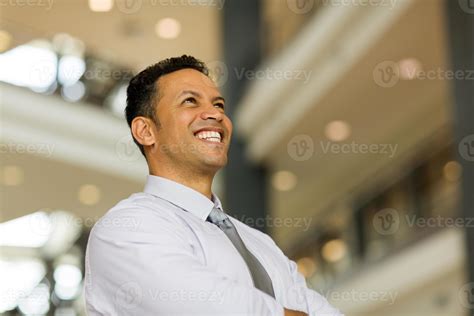 middle aged business man in modern office 992968 Stock Photo at Vecteezy