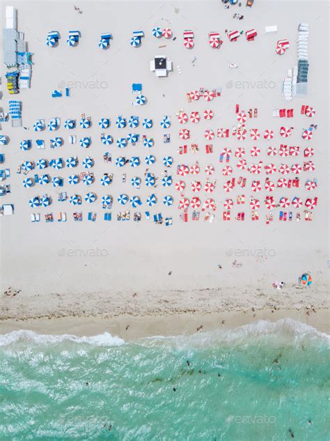 Drone aerial view at Miami South Beach Florida, Beach with colorful ...